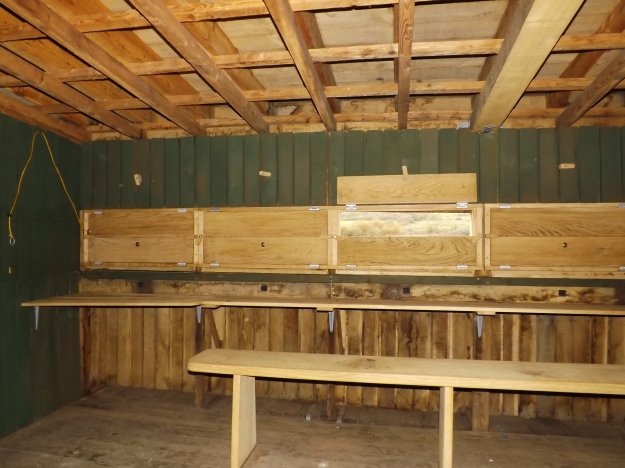 The inside of the hide with its new bench, shelf and shutters