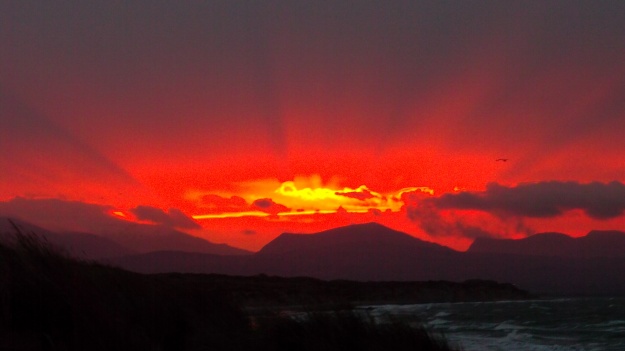 Red sky in the morning, shepherds' warning? Sunrise behind Mynydd Mawr.